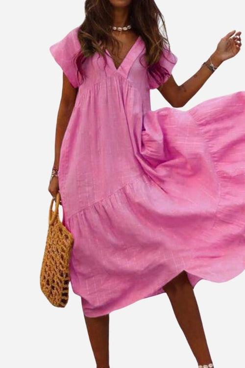Pink V neck tiered cotton midi dress with short sleeves and frill hem