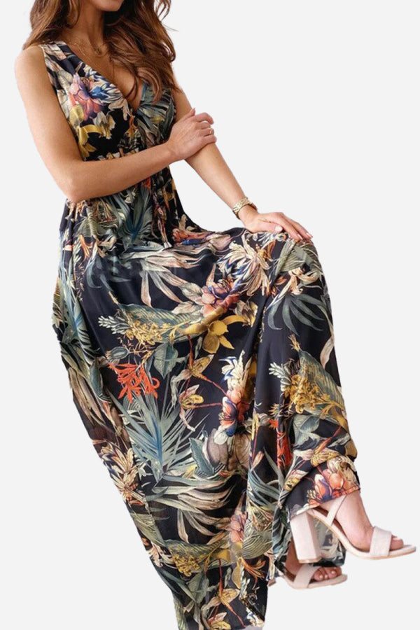 Woman wearing a casual sleeveless dress with colorful floral print and v-neck design