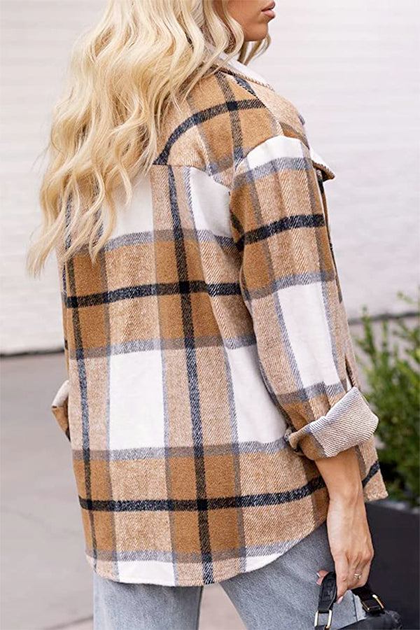 Woman wearing long sleeve plaid flannel shirt in beige, white, and black check pattern, casual fit.