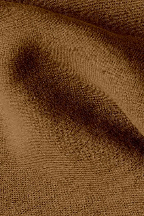 Close-up of brown cotton linen fabric texture showing breathable Retro Monochrome Linen material