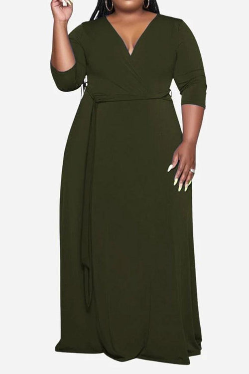 Elegant plus size dress with belt, deep V-neck, and 3/4 sleeves in solid color
