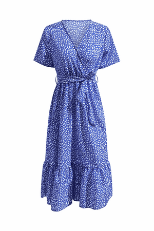 Charming floral boho maxi dress with wrap V-neck, belted waist, ruffle hem, short sleeves, and blue floral print.