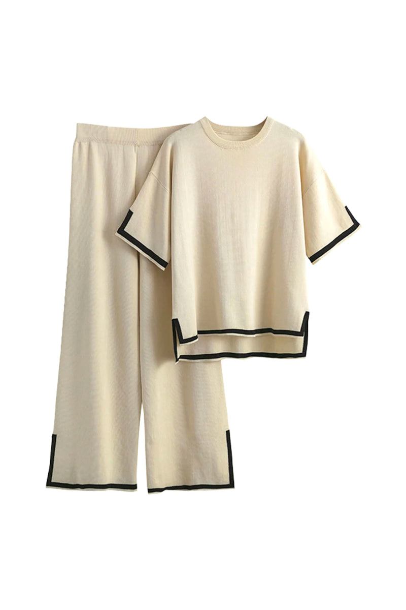 Short sleeved relaxed fit lounge two-piece set with beige top and wide-leg pants trimmed in black