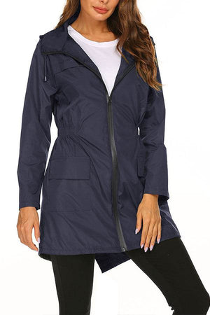 Women's outdoor and travel hooded raincoat windbreaker jacket in navy blue with zipper and pockets