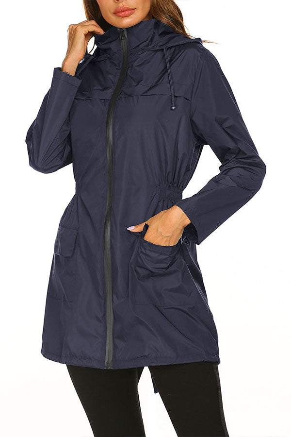 Outdoor and Travel Hooded Raincoat windbreaker jacket in navy blue, lightweight and weather resistant with zip closure and front pockets.