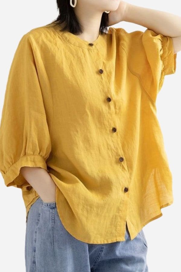 Relaxed loose breathable linen blouse in mustard yellow with button-down front and 3/4 puff sleeves