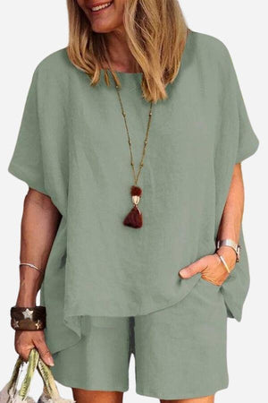 Comfy linen-like shirt and shorts two-piece set in sage green with loose fit and breathable fabric.