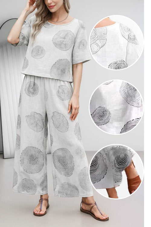 Loose fit co-ord set with wide-leg pants and short sleeve top in light fabric with circular print pattern