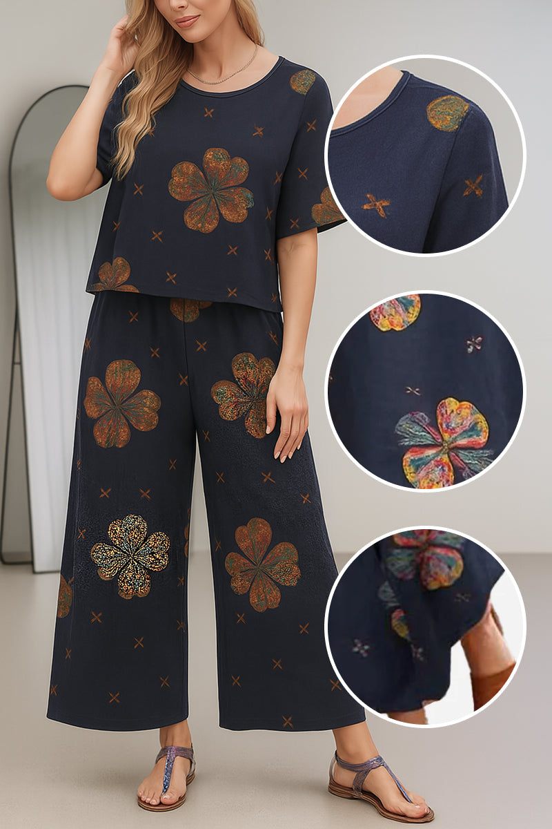 Loose Fit Co-ord Set featuring wide-leg pants and short-sleeve top with floral prints in breathable cotton-linen blend.
