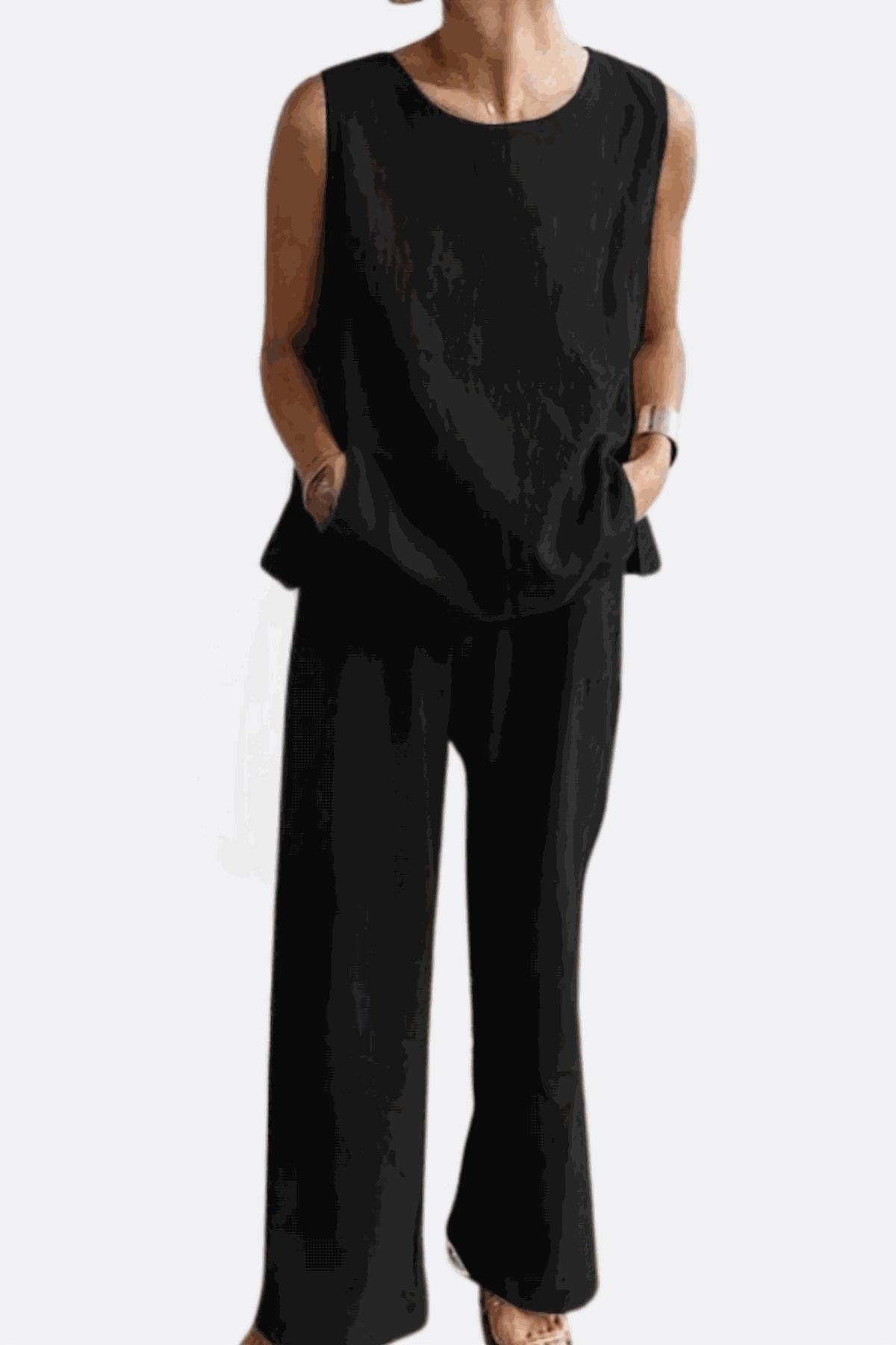 Loose solid color sleeveless two-piece set with oversized fit and wide-leg pants in black
