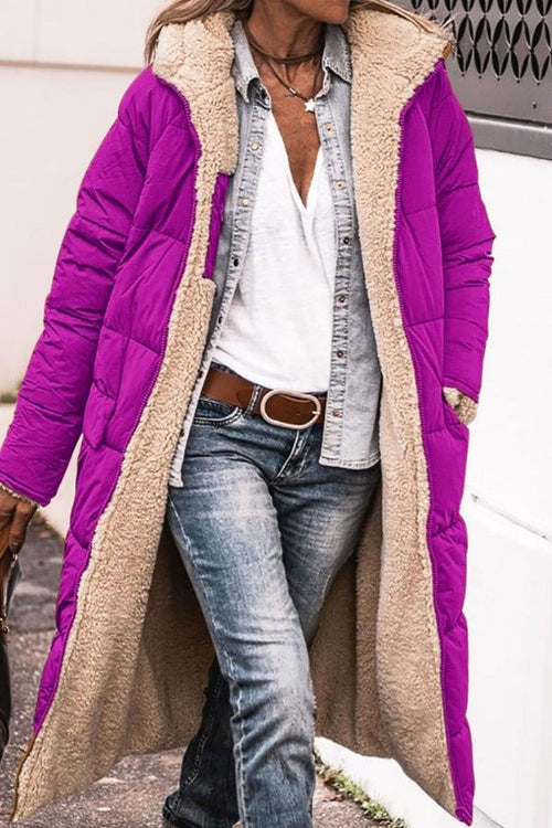 Long purple Sherpa-lined hooded teddy coat with plush interior and durable puffer exterior worn open over casual outfit