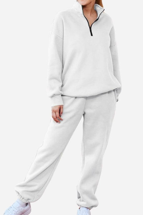 Ultra-soft and comfy co-ord tracksuit set in light gray with a zip-up pullover and relaxed jogger pants