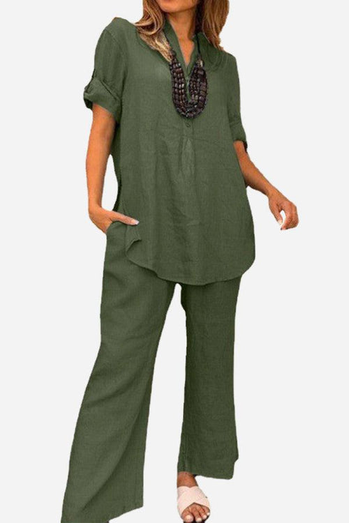Olive green short-sleeved V-neck top and wide trouser suit in premium cotton with a loose, drapey fit for casual and semi-formal wear.