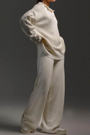 Plush & Preppy Camel two-piece set featuring a cozy knit pullover with polo collar and wide-leg pants in camel color for travel and casual wear.