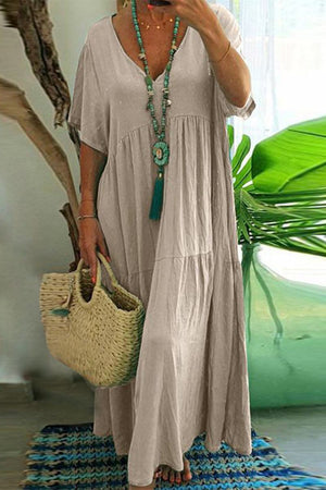 Beige V-neck two-tiered maxi swing dress made of lightweight cotton with loose fit and flowy tiers