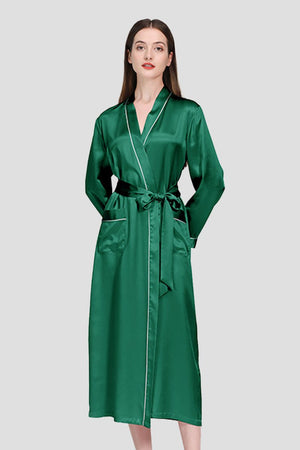 Woman wearing green 100% mulberry silk belted classy nightgown with long sleeves and pockets
