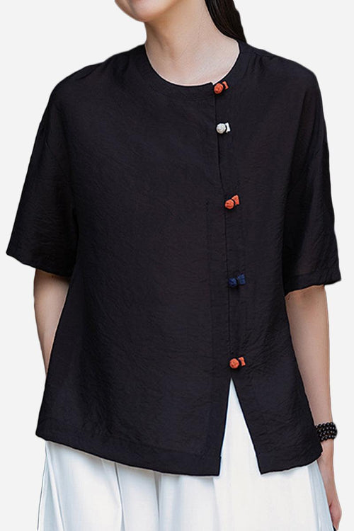 Black regenerated cellulose blouse with asymmetrical colorful buttons and oversized fit
