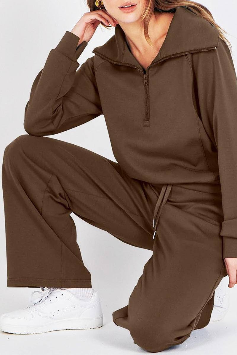 woman wearing brown loungewear buttersoft tracksuit set with zip-up top and relaxed pants