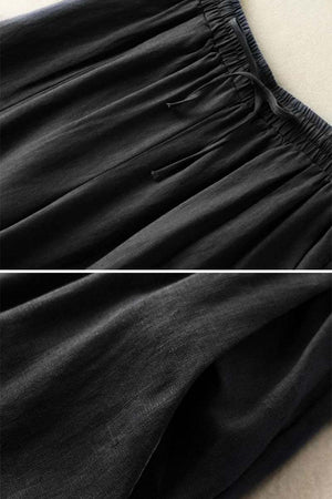 Black wide-leg cotton linen Tuscany trousers with elastic waistband and drawstring detail