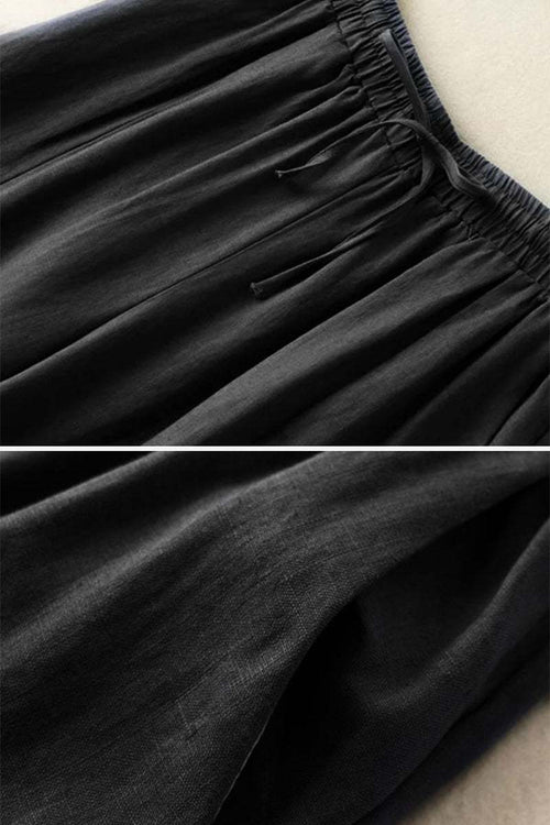 Black wide-leg cotton linen Tuscany trousers with elastic waistband and drawstring detail