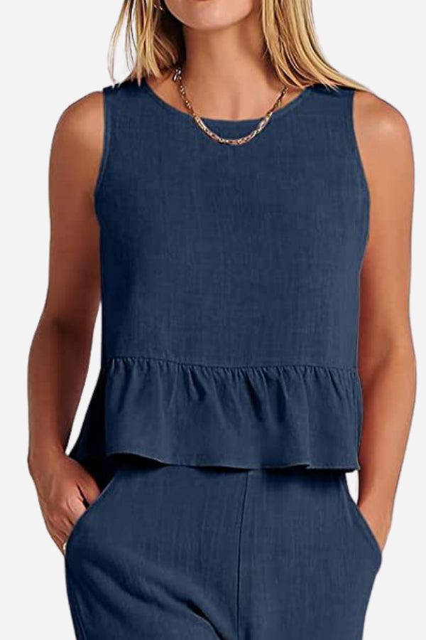 Navy blue sleeveless linen-like feel set with peplum top and matching pants for comfortable stylish wear