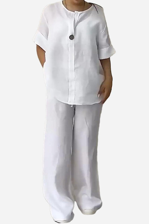 White pure linen two-piece casual comfort set with one-button top and loose pants for breathable, stylish wear