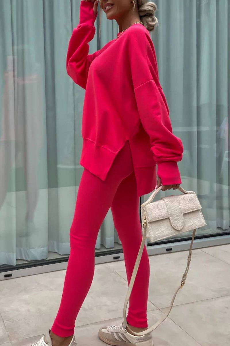Woman wearing bright pink TimelessChic Ultra Comfortable Two-Piece Set with loose top and fitted leggings outdoors