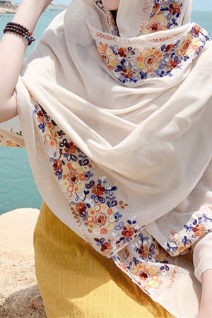 Lightweight embroidered travel-must shawl wrap with floral details and versatile wear styles
