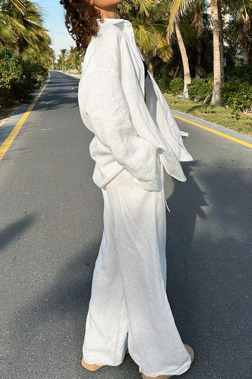 woman wearing white 100% cotton Wanderlust two-piece set walking outdoors