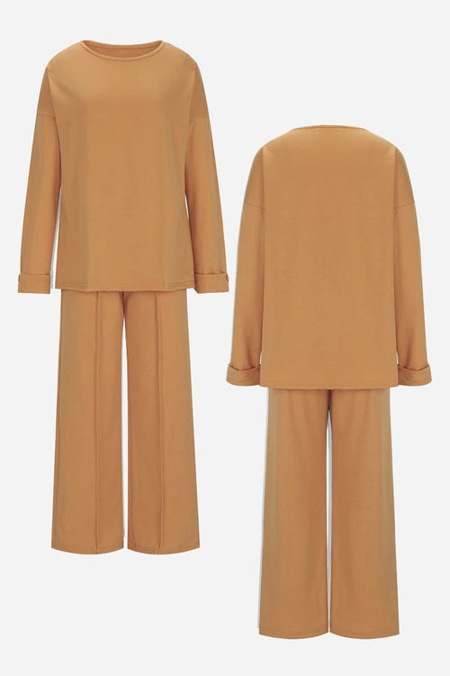 Camel-colored comfortable travel-ready two-piece set with relaxed top and wide-leg pants, wrinkle-resistant fabric