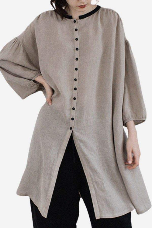 100% linen oversized button-down tunic in neutral grey with flowy sleeves and contrast buttons