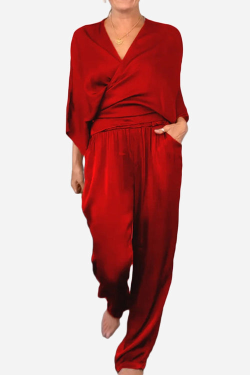 Red Satin Wrap Lounge two-piece set with V-neck top and relaxed pants for all-day comfort