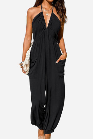 Sunshine On Sand halter-neck black jumpsuit with ruched neckline and elastic ankle cuffs