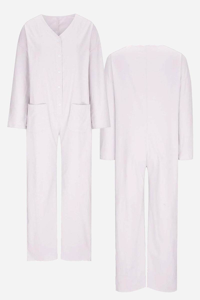 Front and back view of a light lavender relaxed jumpsuit with button-front, long sleeves, and pockets