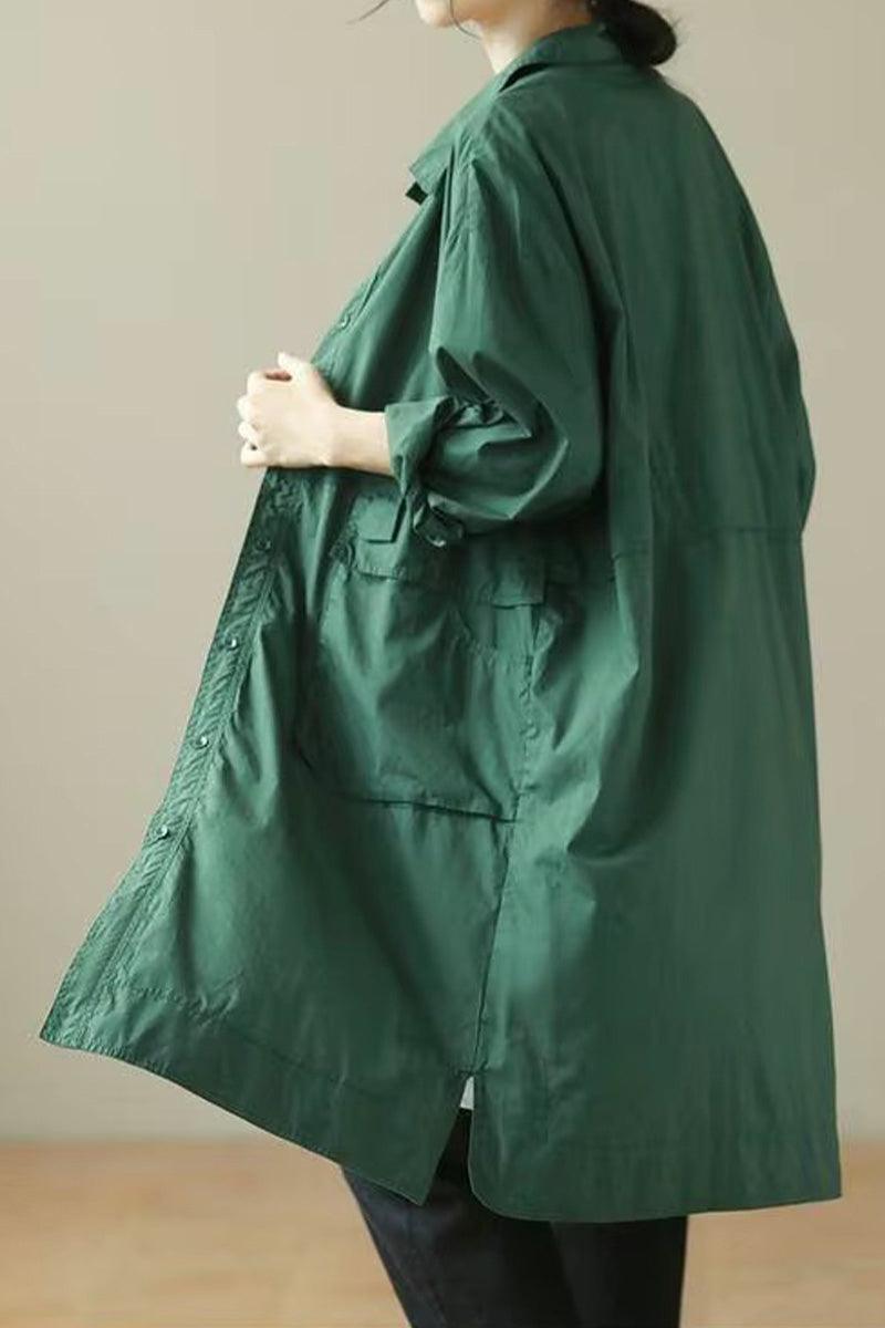Nomad Ease Oversized Shirt-Jacket in green with roll-up sleeves and large front pockets, worn as lightweight jacket.