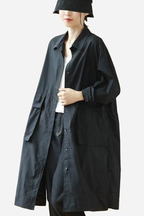 Black Nomad Ease oversized shirt-jacket with roll-up sleeves and large front pockets worn by a model