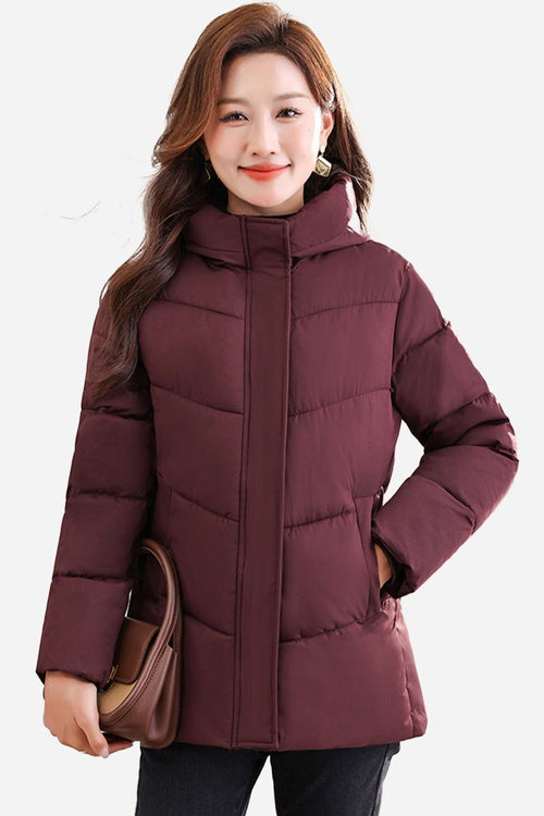 Mid-length maroon Everyday Warmth Coat with hood and insulated 5-layer thermal design for lightweight warmth.