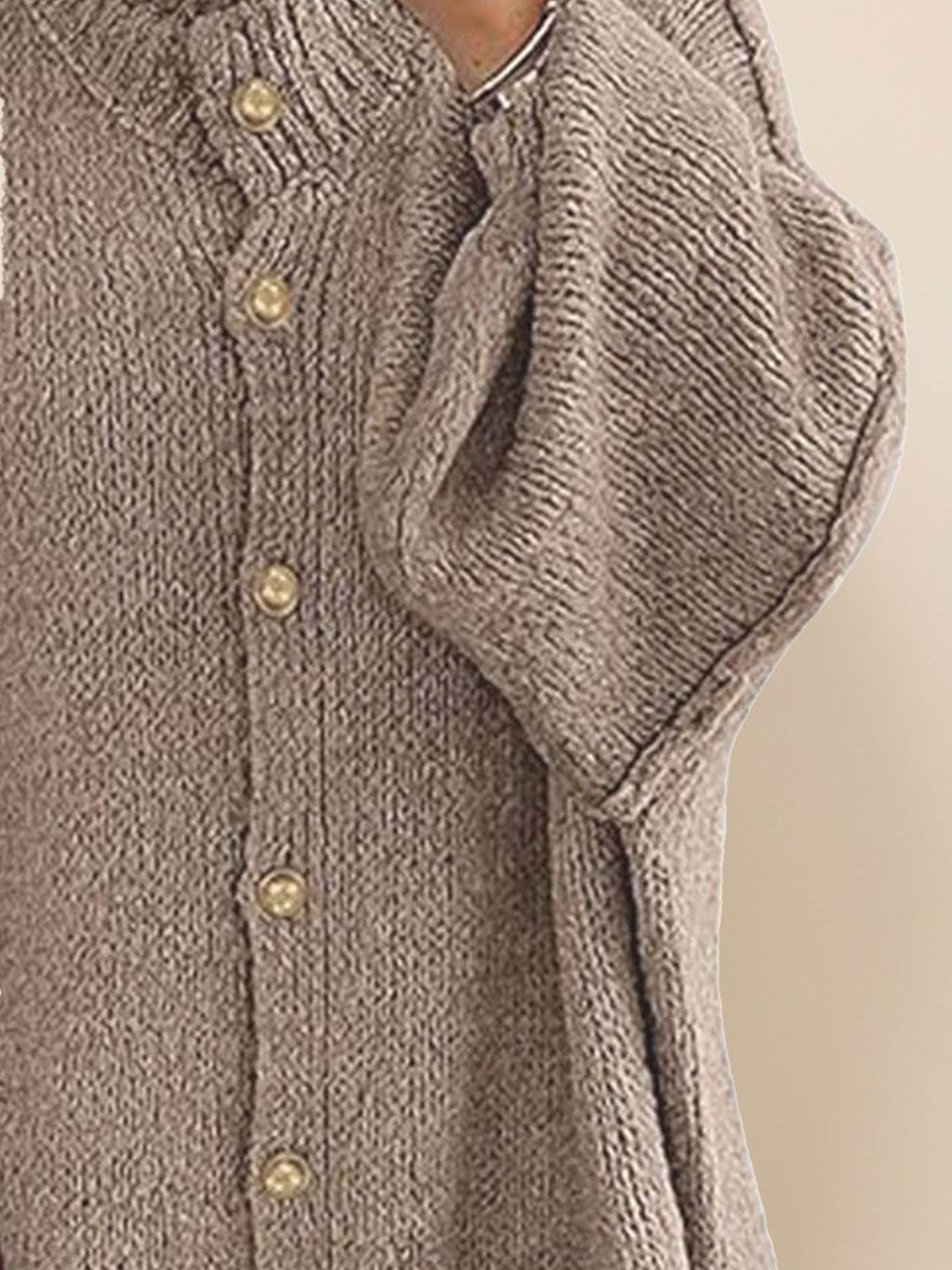 Oversized button-front knit cardigan with balloon sleeves and gold-tone buttons in chunky knit texture