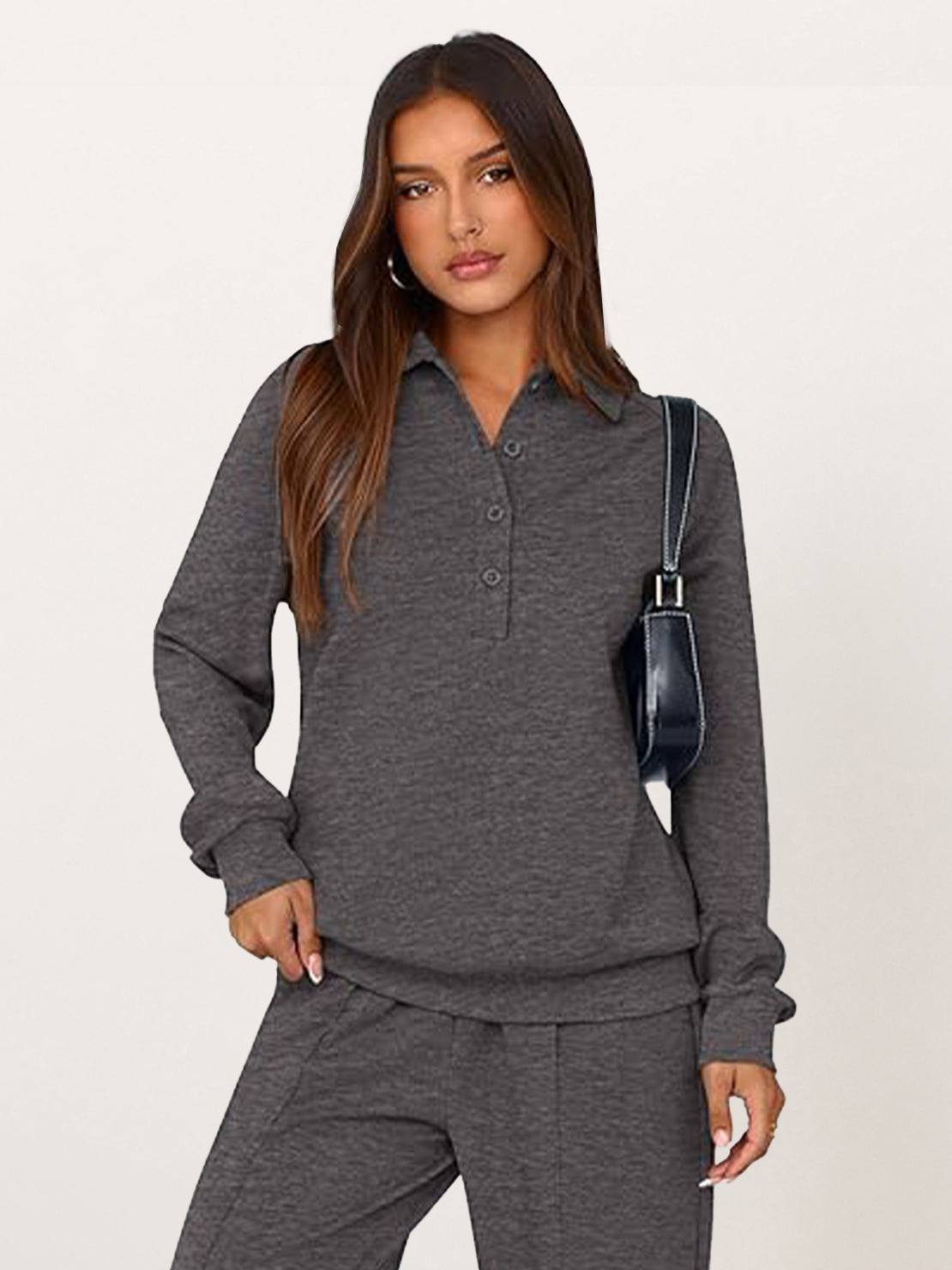 Women’s wrinkle-free polo set with quarter-button top and high-waisted pants in breathable fabric