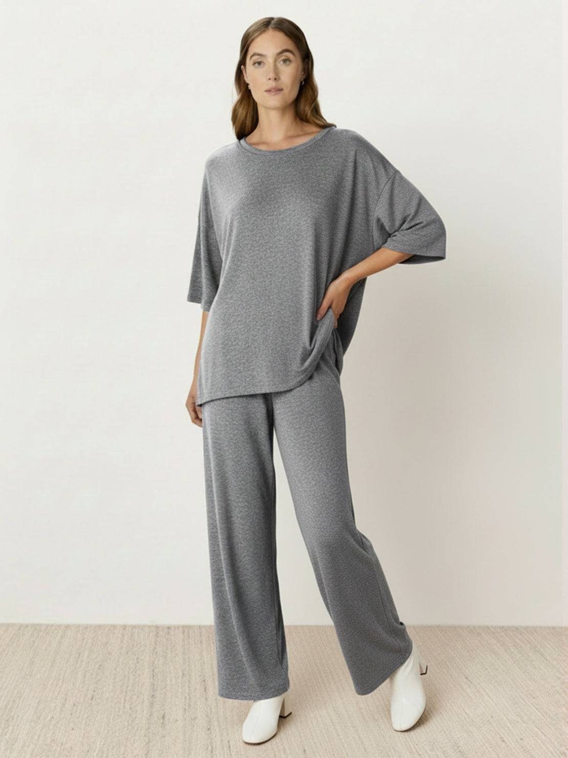 Oversized long-line loungewear set with oversized pullover and straight-leg pants in soft knit fabric