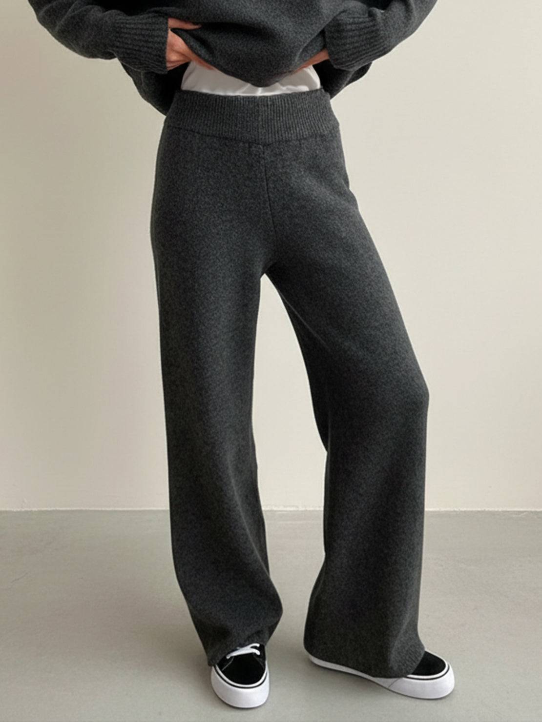 Woman wearing soft-knit turtleneck top with wide-leg pants two-piece set