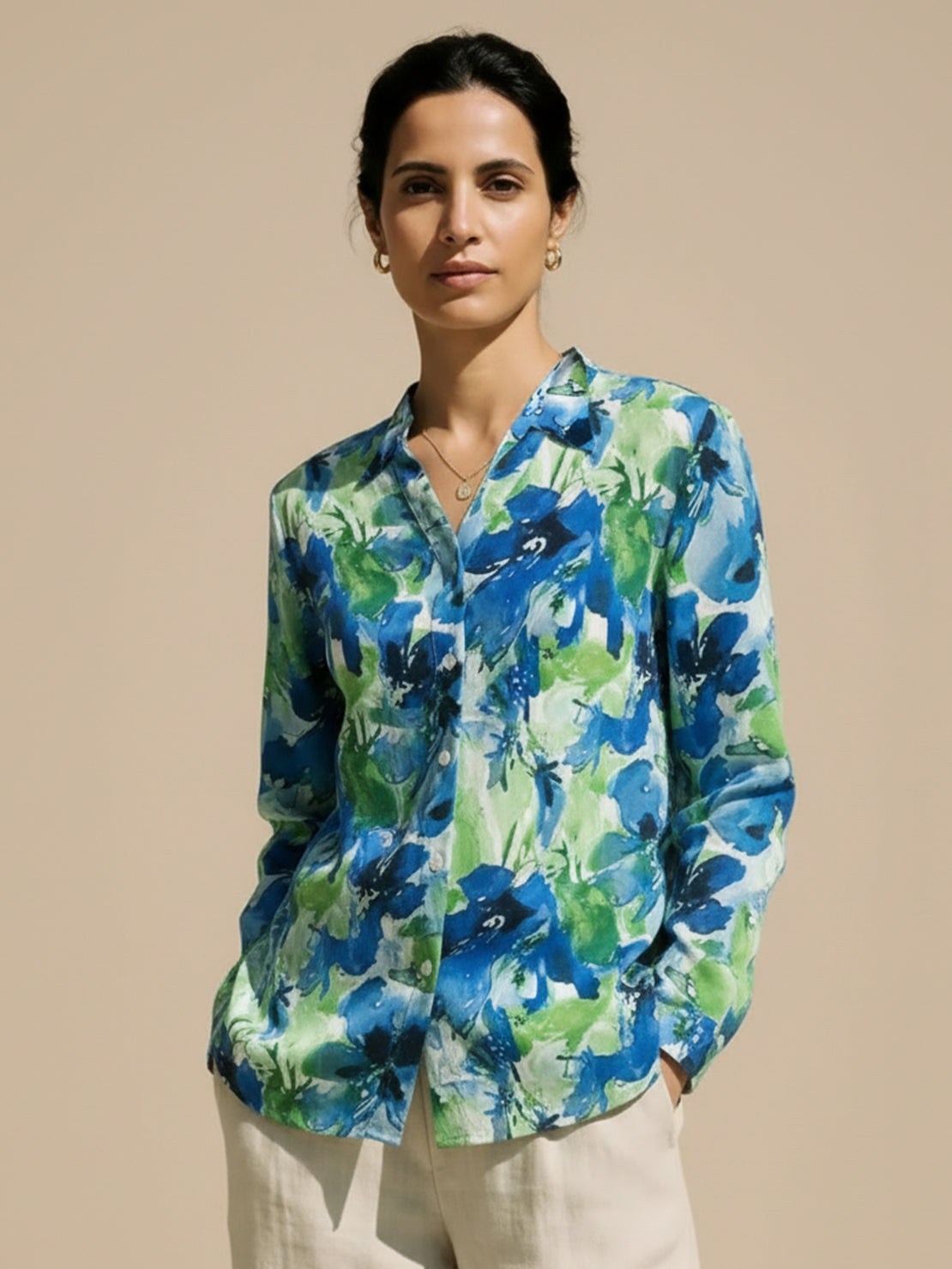 Floral button-down shirt with long roll-up sleeves and hip-length relaxed fit