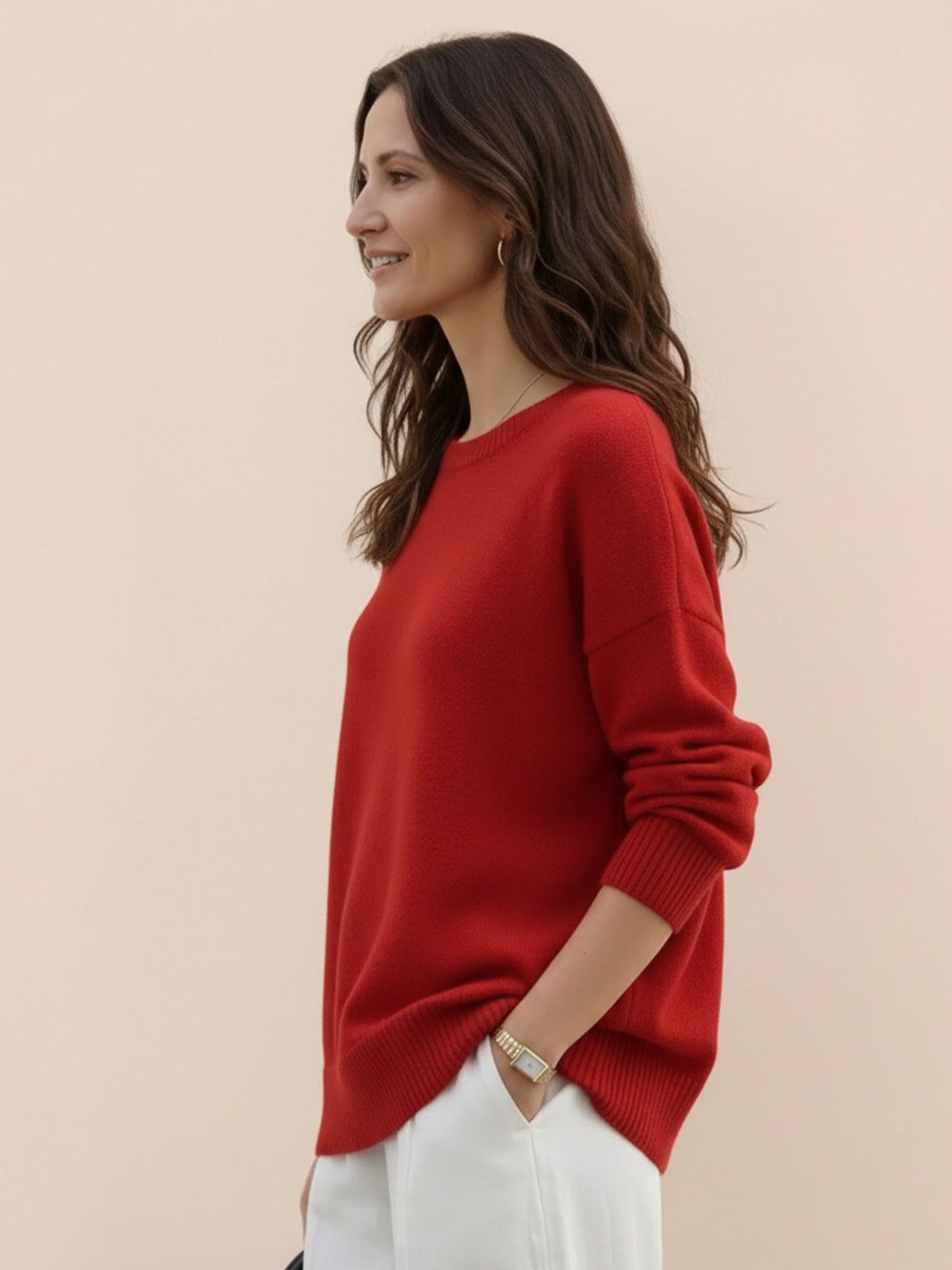 Oversized crew neck knit sweater with drop-shoulder sleeves and ribbed cuffs in neutral color
