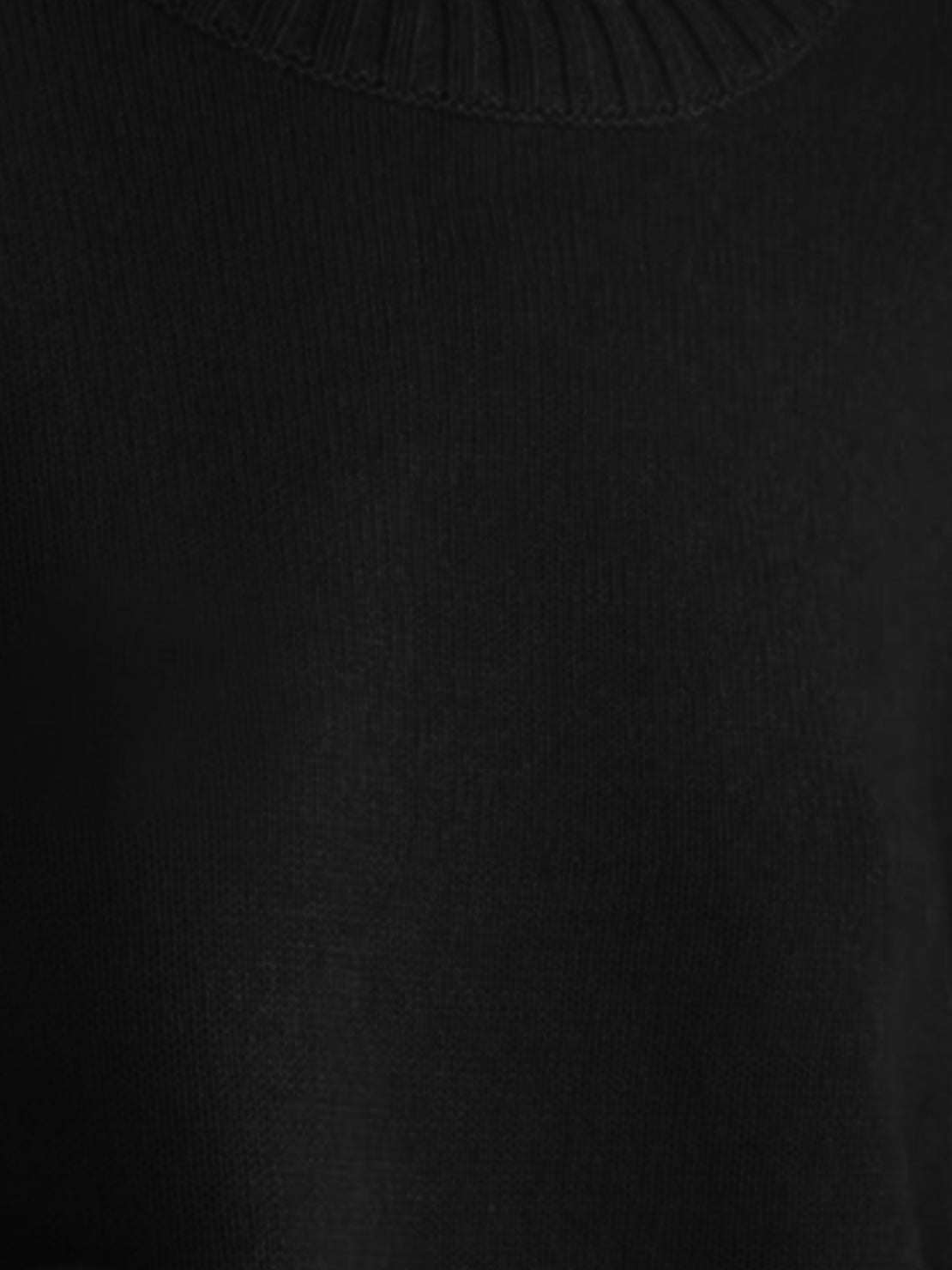 Oversized crew neck knit sweater with drop-shoulder sleeves and ribbed cuffs in neutral color