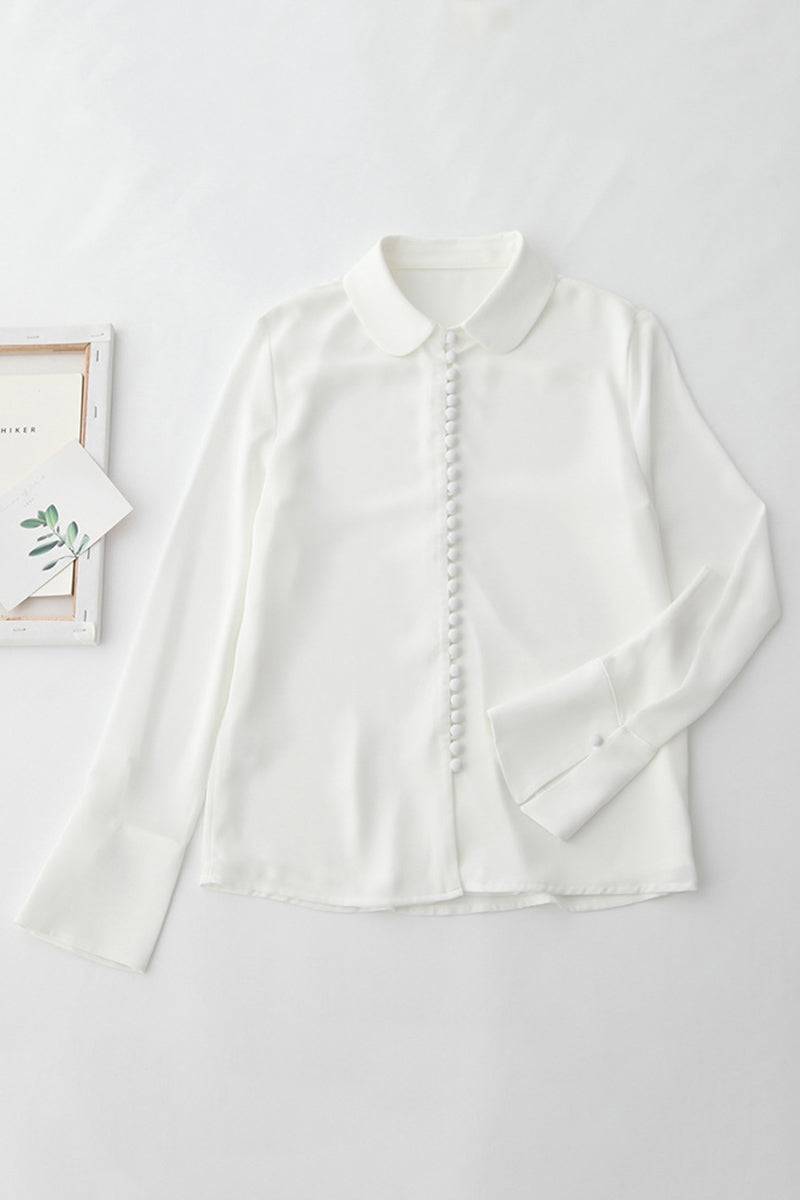 White Bayam Blouse with button-down front and classic collar, made from 100% polyester, ideal for work or casual wear