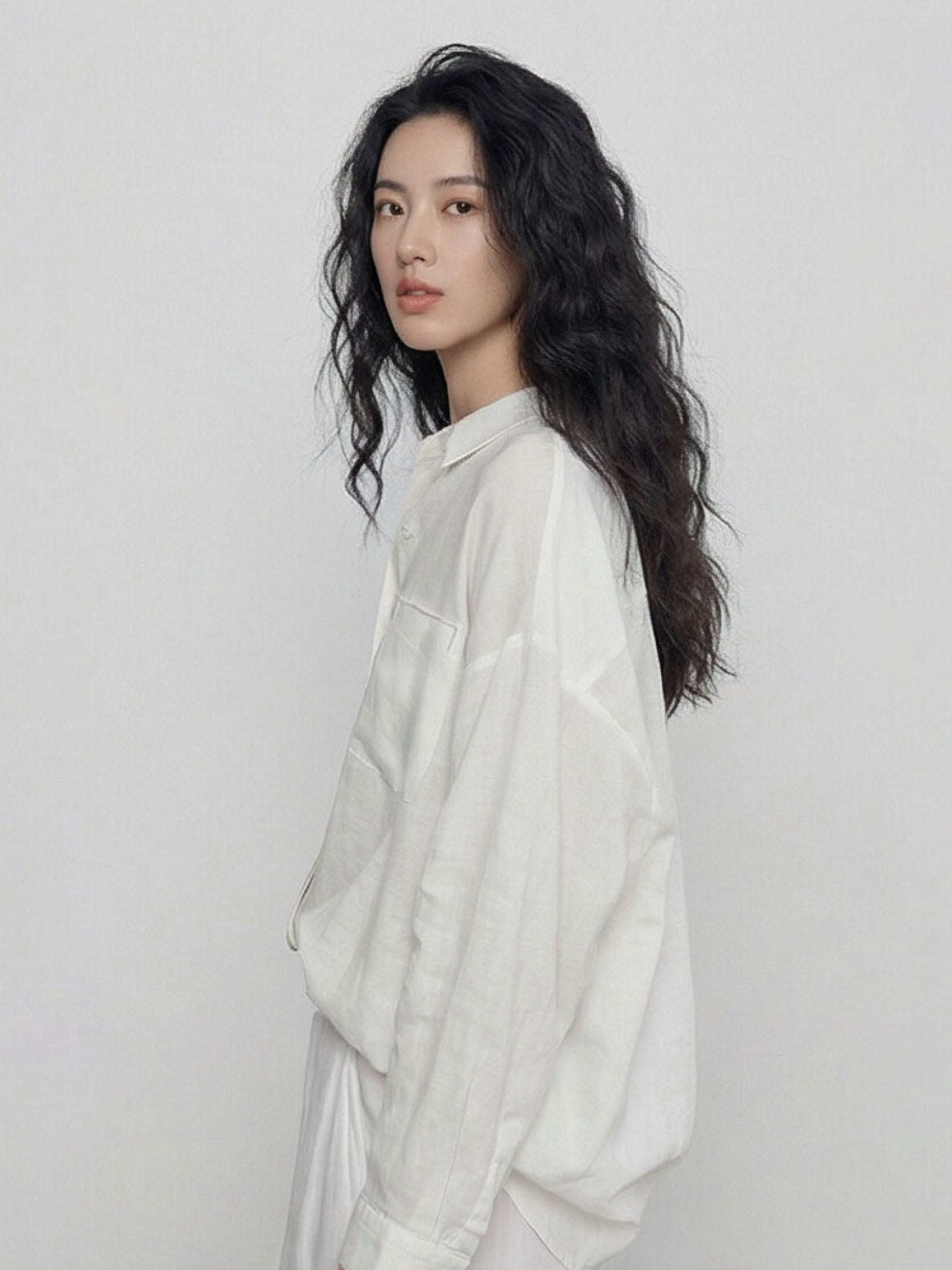 White oversized 100% cotton-linen relaxed fit shirt with dropped shoulders and curved hem