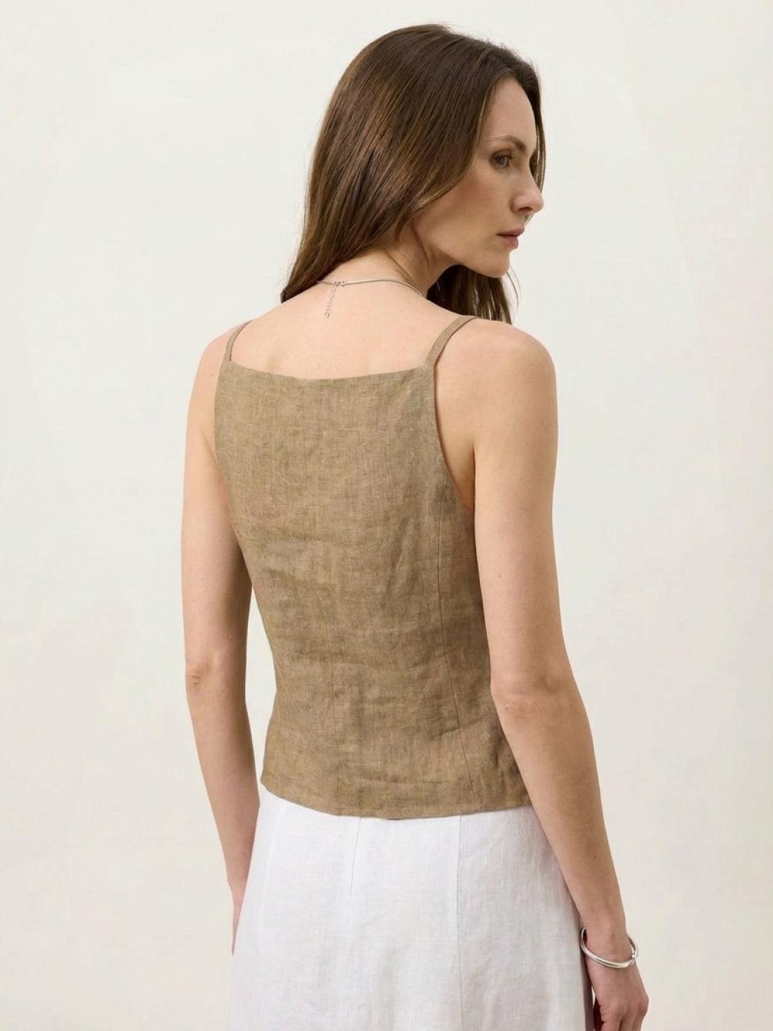 100% linen yarn-dyed vest with square neckline, spaghetti straps, button-front, and welt pockets