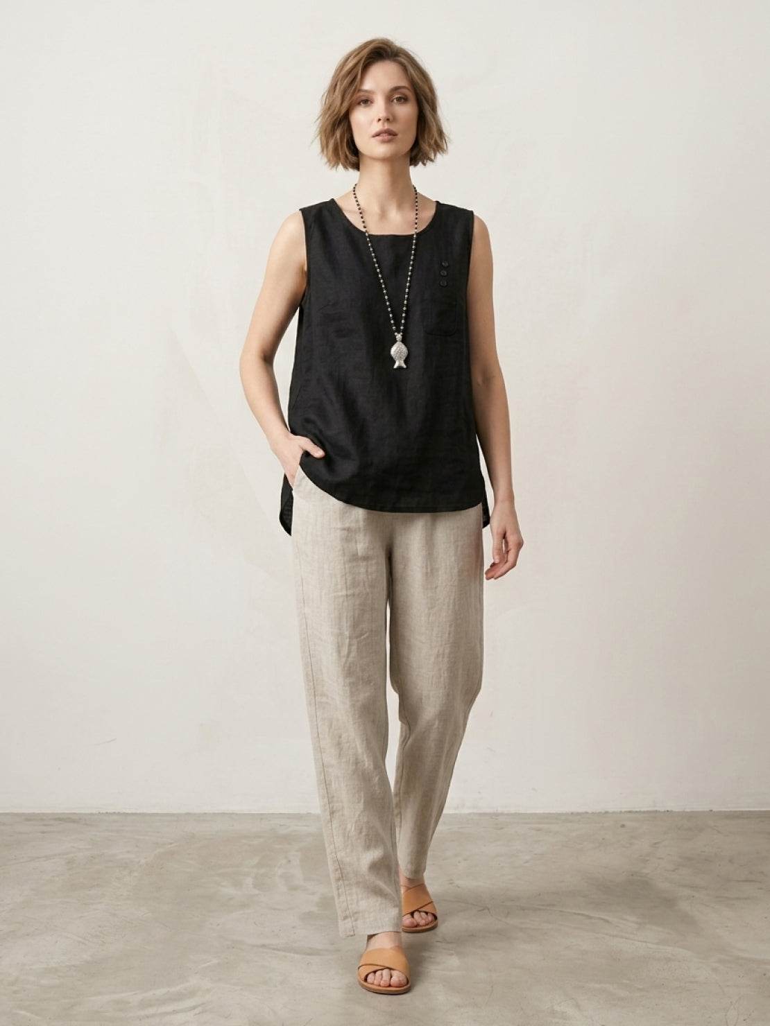 Lightweight 100% cotton linen sleeveless top with curved hem and chest pocket