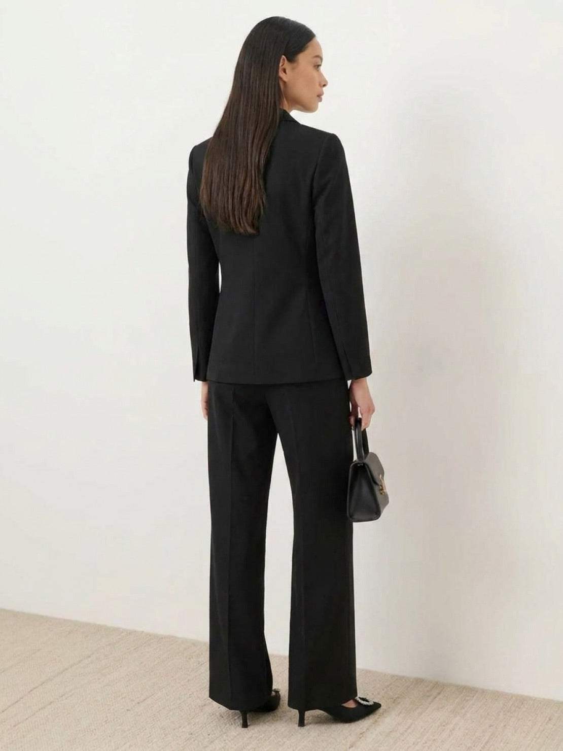 Structured double-breasted blazer with gold lion-head buttons and wide-leg trousers co-ord set