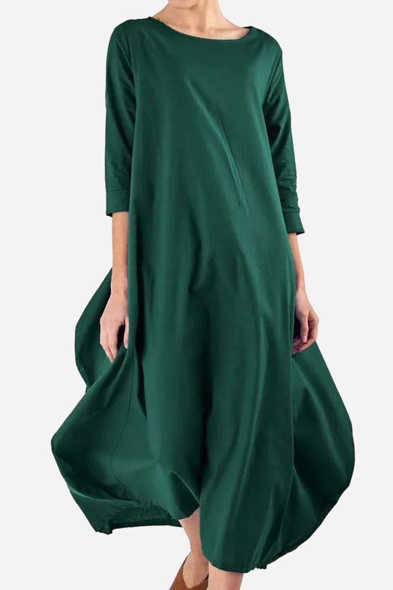 Bohemian maxi dress in dark green oversized linen blend with long sleeves and loose fit